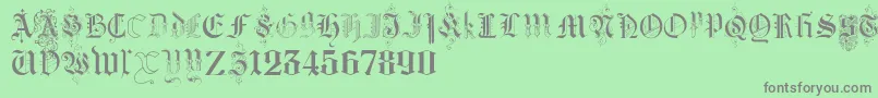 KidnappedAtGermanLandsThree Font – Gray Fonts on Green Background