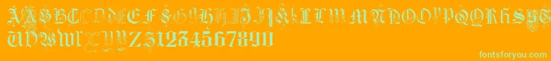 Шрифт KidnappedAtGermanLandsThree – зелёные шрифты на оранжевом фоне