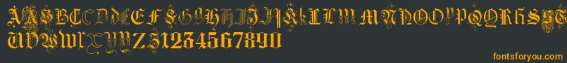 Шрифт KidnappedAtGermanLandsThree – оранжевые шрифты на чёрном фоне
