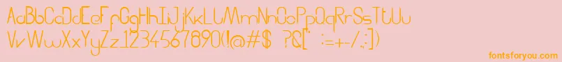 Aggressor Font – Orange Fonts on Pink Background
