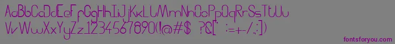 Aggressor Font – Purple Fonts on Gray Background