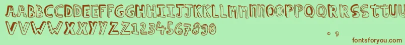 Hcapstrial Font – Brown Fonts on Green Background