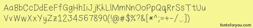EkasHandwriting Font – Black Fonts on Yellow Background