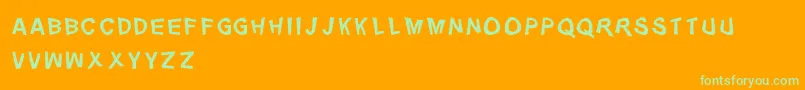 Distorty-Schriftart – Grüne Schriften auf orangefarbenem Hintergrund