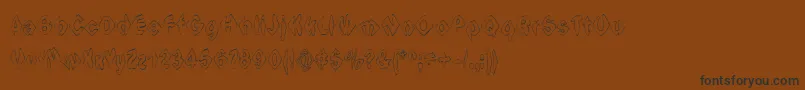 フォントIngothicalWeird – 黒い文字が茶色の背景にあります