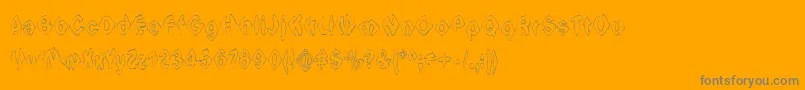 IngothicalWeird-Schriftart – Graue Schriften auf orangefarbenem Hintergrund