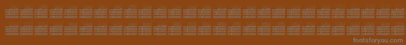 Шрифт LogicTwentyFiveQ – серые шрифты на коричневом фоне