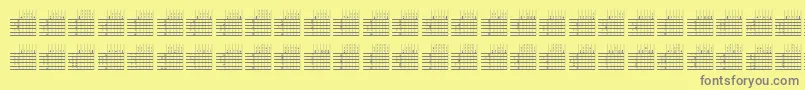 LogicTwentyFiveQ-fontti – harmaat kirjasimet keltaisella taustalla