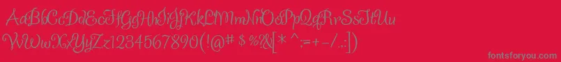 フォントSladkoeshka – 赤い背景に灰色の文字