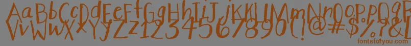 StretchyPants Font – Brown Fonts on Gray Background