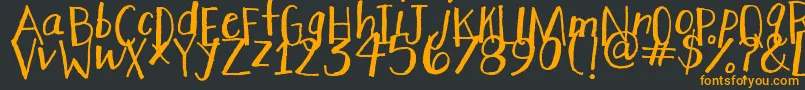 StretchyPants Font – Orange Fonts on Black Background