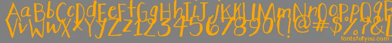 StretchyPants Font – Orange Fonts on Gray Background