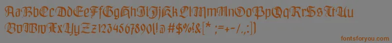 フォントBayreuthfraktur – 茶色の文字が灰色の背景にあります。