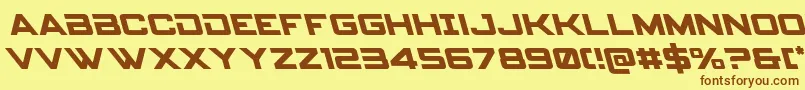 フォントSpyagencyv3left – 茶色の文字が黄色の背景にあります。