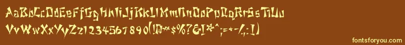 Ahsoossk-fontti – keltaiset fontit ruskealla taustalla