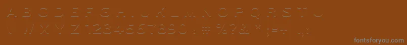 Ugo3DColor Font – Gray Fonts on Brown Background