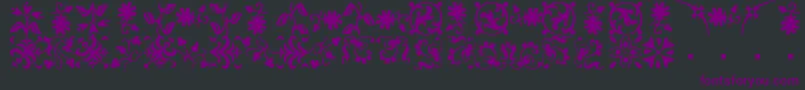 Czcionka BorderbatsFleurRegular – fioletowe czcionki na czarnym tle