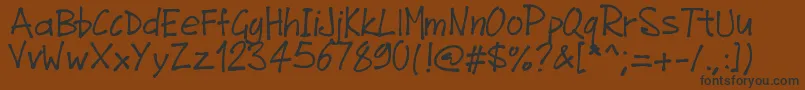 Pwjunefont Font – Black Fonts on Brown Background