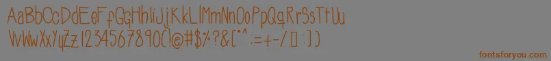 Soozieqs Font – Brown Fonts on Gray Background