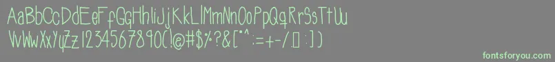 Soozieqs Font – Green Fonts on Gray Background