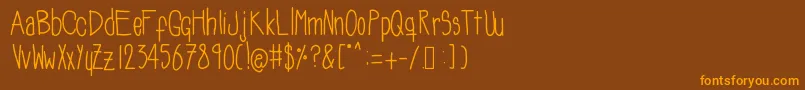 Soozieqs Font – Orange Fonts on Brown Background