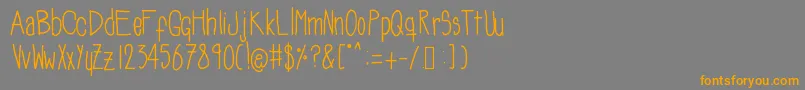 Soozieqs Font – Orange Fonts on Gray Background