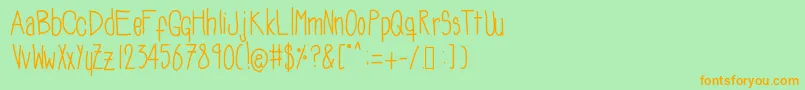 Soozieqs Font – Orange Fonts on Green Background