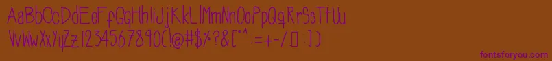 Soozieqs Font – Purple Fonts on Brown Background