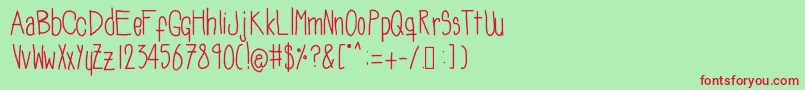 フォントSoozieqs – 赤い文字の緑の背景