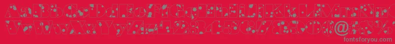 ABraggadr Font – Gray Fonts on Red Background