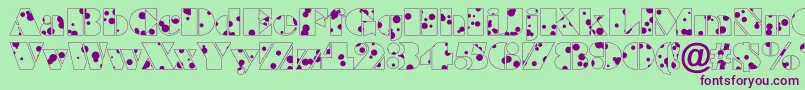ABraggadr Font – Purple Fonts on Green Background