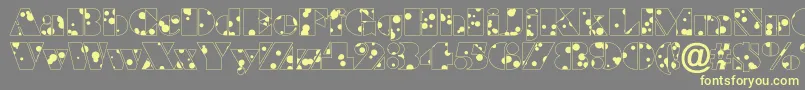 ABraggadr-fontti – keltaiset fontit harmaalla taustalla