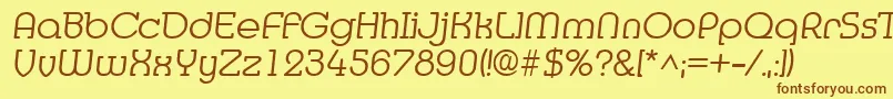 フォントMediaItalic – 茶色の文字が黄色の背景にあります。