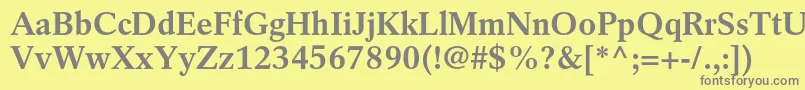 RotationltstdBold-fontti – harmaat kirjasimet keltaisella taustalla