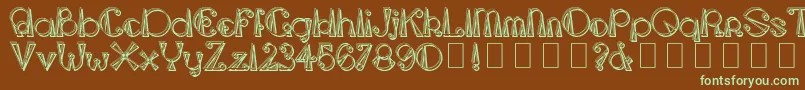 フォントTriangleetcircleShadow – 緑色の文字が茶色の背景にあります。