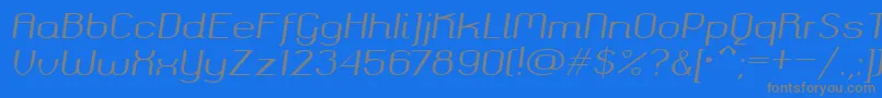Okolaksregularitalic-fontti – harmaat kirjasimet sinisellä taustalla