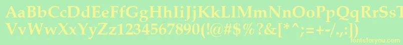 フォントZapfCalligraphic801BoldSwa – 黄色の文字が緑の背景にあります