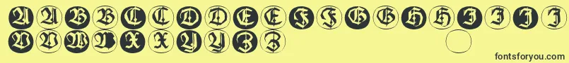 Шрифт Frakturinitialenangularround – чёрные шрифты на жёлтом фоне
