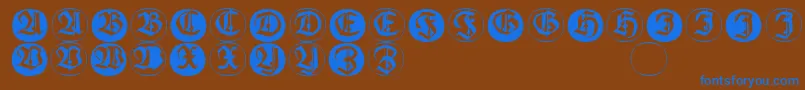 Шрифт Frakturinitialenangularround – синие шрифты на коричневом фоне