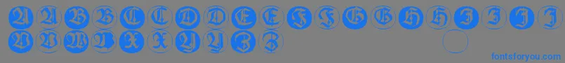 Frakturinitialenangularround-fontti – siniset fontit harmaalla taustalla