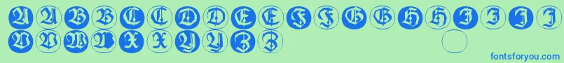 フォントFrakturinitialenangularround – 青い文字は緑の背景です。