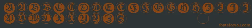Frakturinitialenangularround-fontti – ruskeat fontit mustalla taustalla