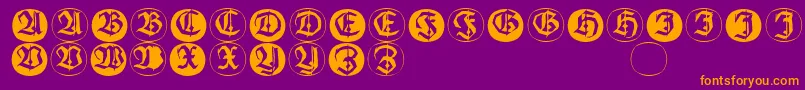 フォントFrakturinitialenangularround – 紫色の背景にオレンジのフォント
