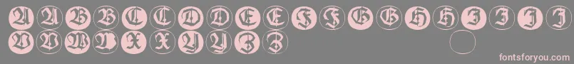 Frakturinitialenangularround-fontti – vaaleanpunaiset fontit harmaalla taustalla