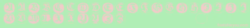 Frakturinitialenangularround-fontti – vaaleanpunaiset fontit vihreällä taustalla
