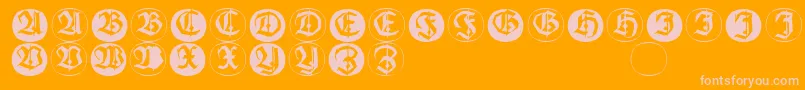Frakturinitialenangularround-fontti – vaaleanpunaiset fontit oranssilla taustalla