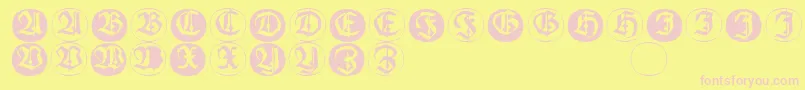 Frakturinitialenangularround-fontti – vaaleanpunaiset fontit keltaisella taustalla