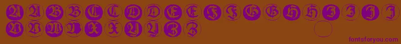 Frakturinitialenangularround-fontti – violetit fontit ruskealla taustalla