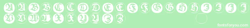 Frakturinitialenangularround-fontti – valkoiset fontit vihreällä taustalla