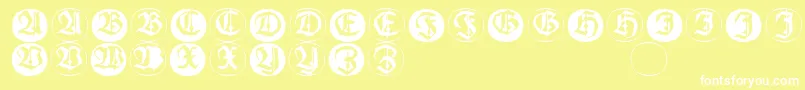 Frakturinitialenangularround-fontti – valkoiset fontit keltaisella taustalla
